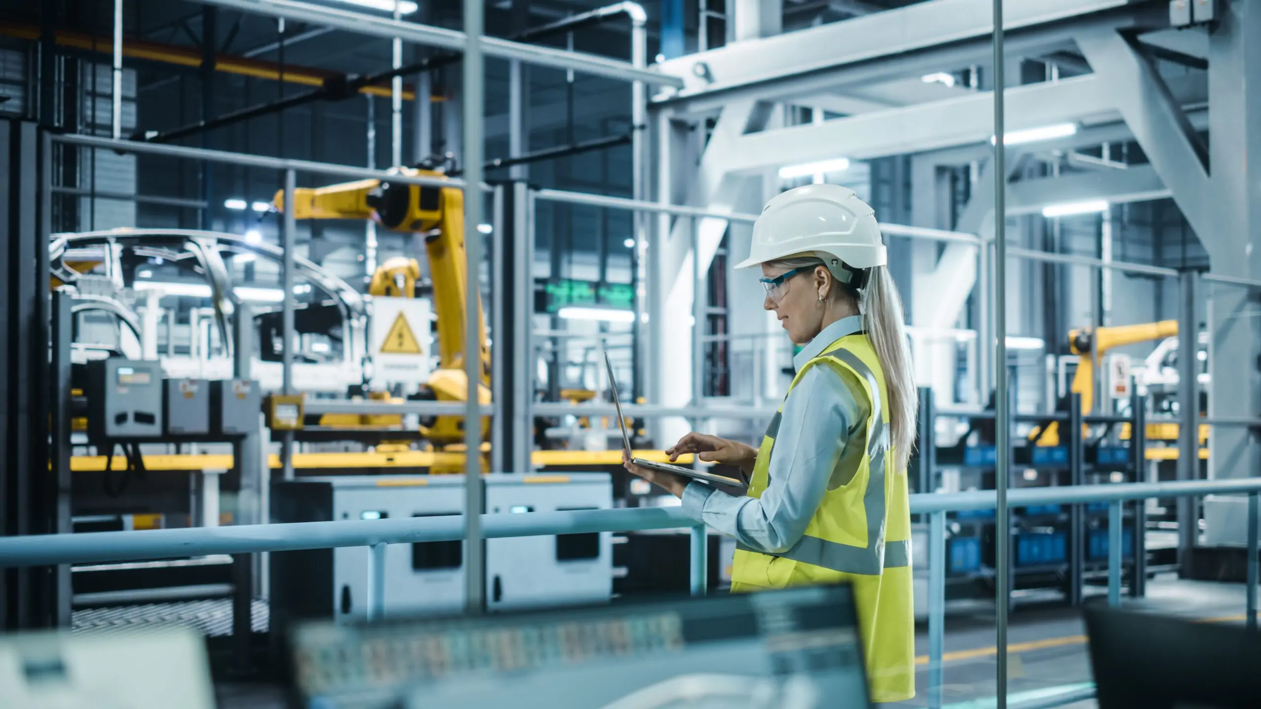 Car,Factory:,Female,Automotive,Engineer,Wearing,Hard,Hat,,Standing,,Using