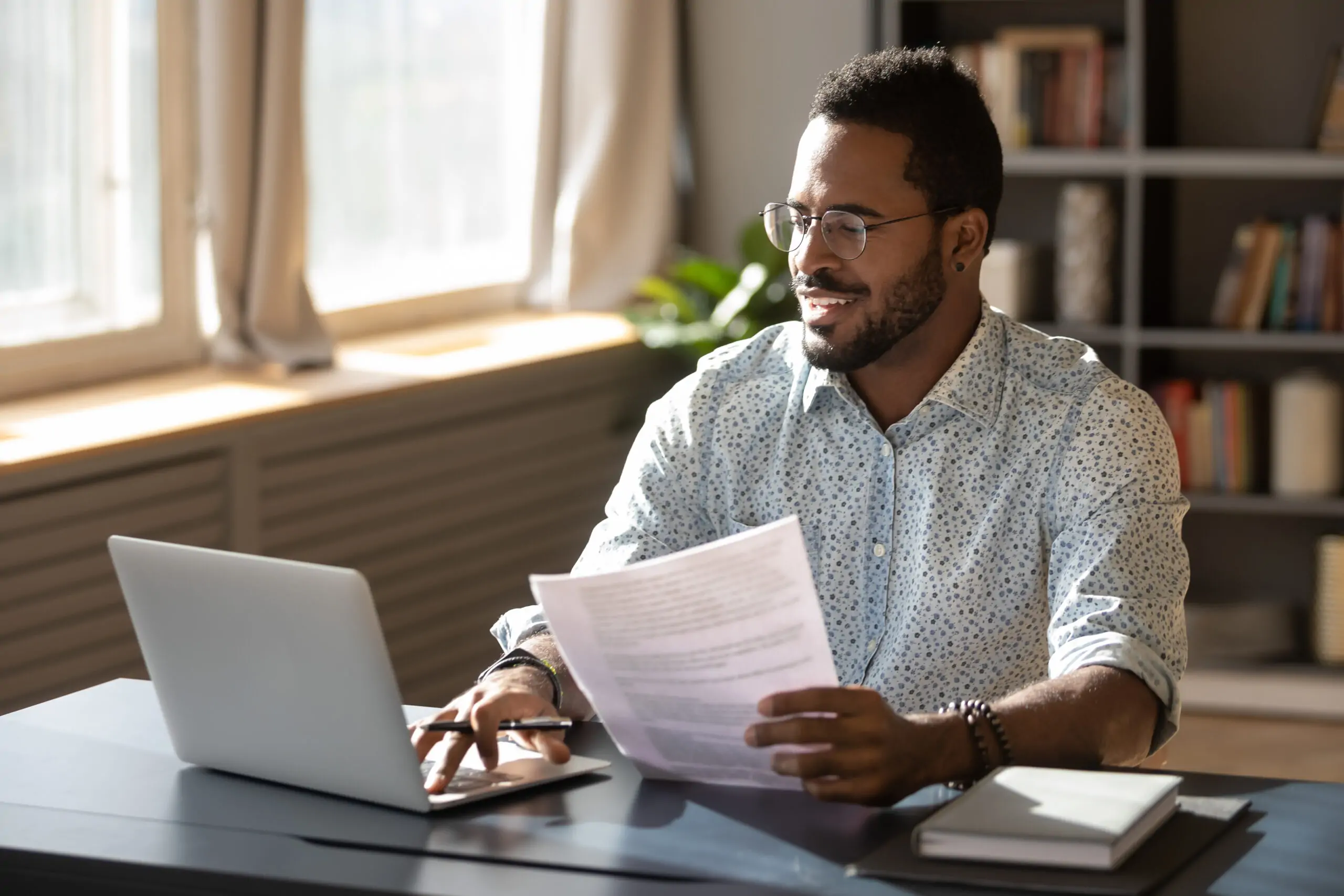 business-owner-at-desk-with-computer